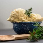 mashed potatoes in blue ceramic bowl